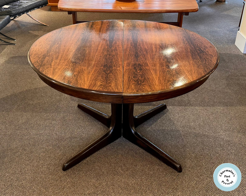 EQUISITE 1960S ROUND ROSEWOOD TABLE WITH TWO LARGE LEAVES...$2000.00